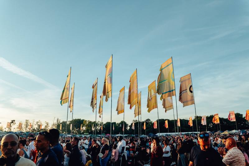 Rows of festival flags above the crowd at the main arena